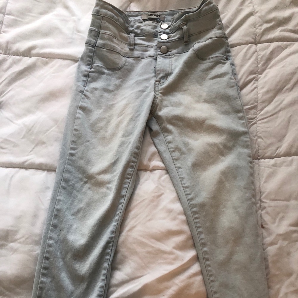 Washed out light blue jeans